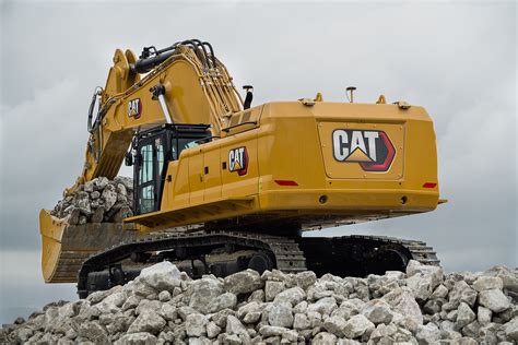 who makes cat excavators